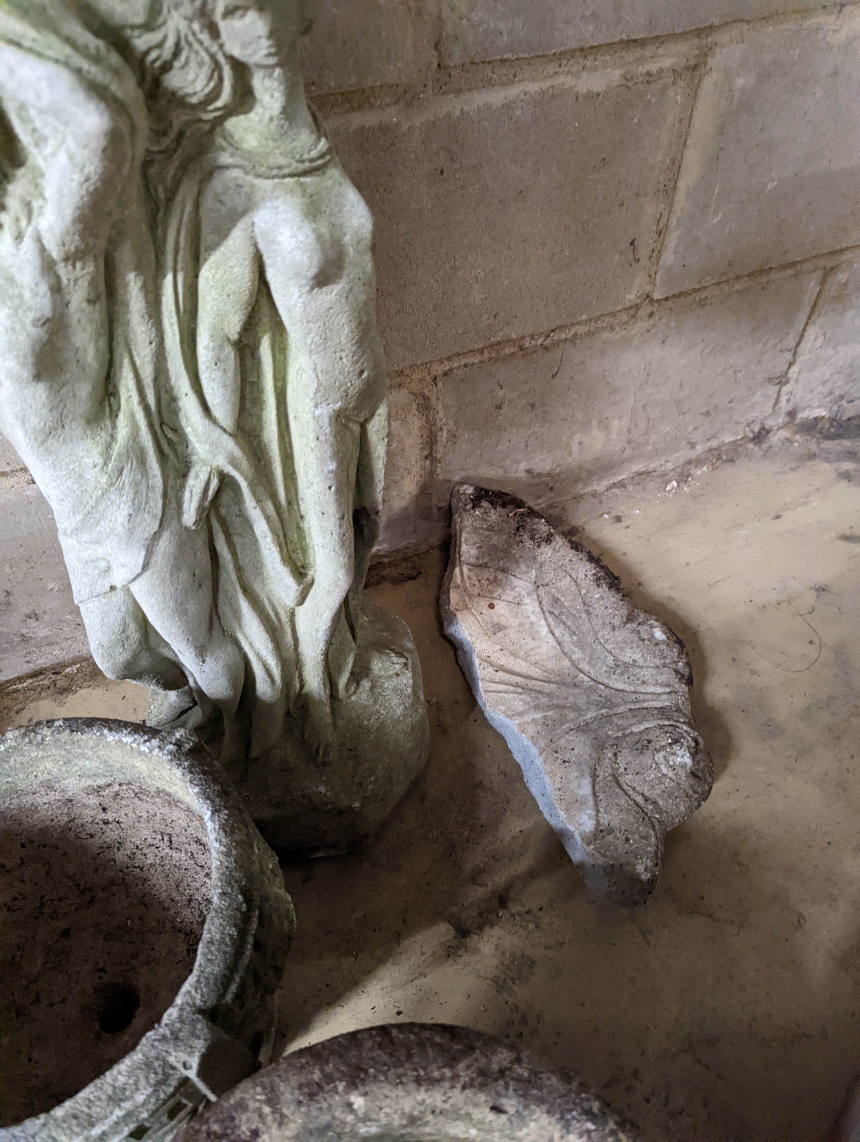 A reconstituted stone bird bath, (damaged) height 80cm together with two circular garden planters